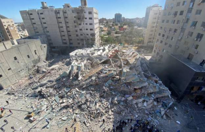 Israel destroys Gaza tower block housing international media, as conflict rages on