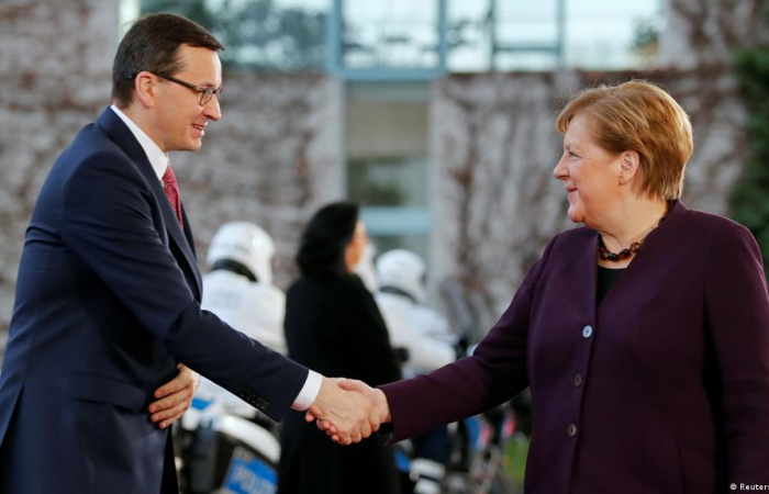 Merkel hopes dialogue will bring solution to EU-Poland dispute