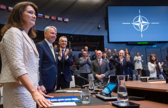 NATO countries sign the accession documents for Finalnd and Sweden to join the alliance