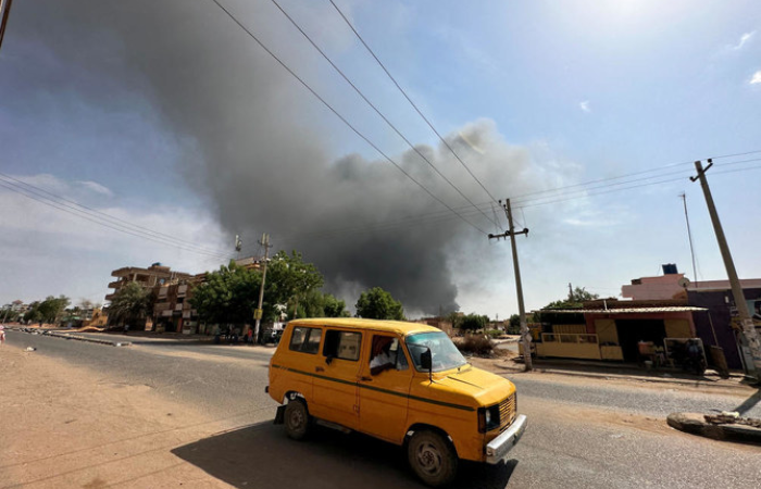 UN warns of "full-scale civil war" in Sudan after air strike on residential area kills at least 22