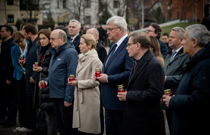 EU diplomats pay their respects in Bucha to mark 2022 massacre