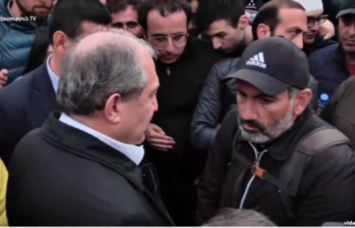 Armenian president makes surprise appearance at opposition rally in an effort to broker talks