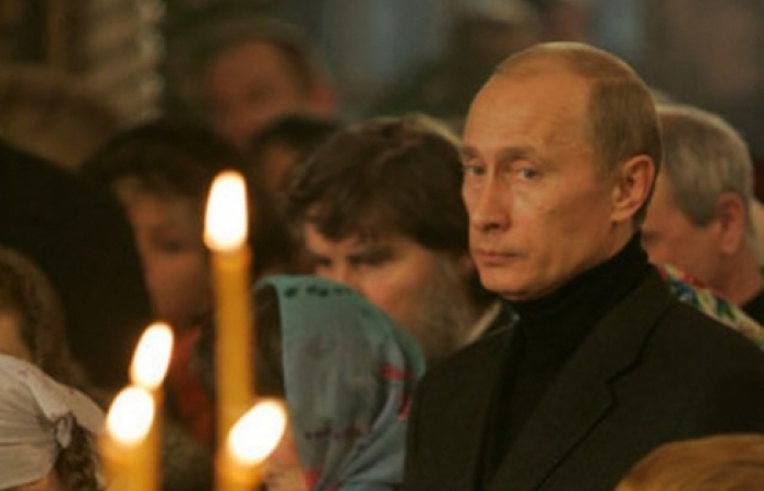 Putin says that as a child he was baptised in secret