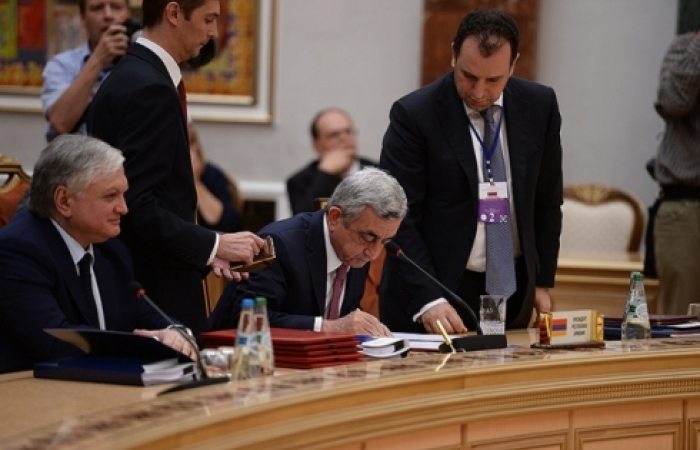 Armenia signs treaty of accession to the Eurasian Economic Union.