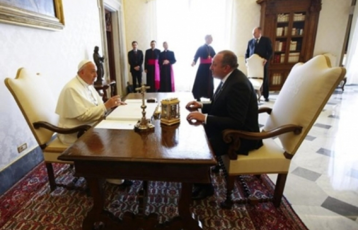 President of Georgia meets Pope Francis at the Vatican.