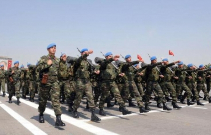 70,000 Turkish conscripts demobilised early following changes in law.