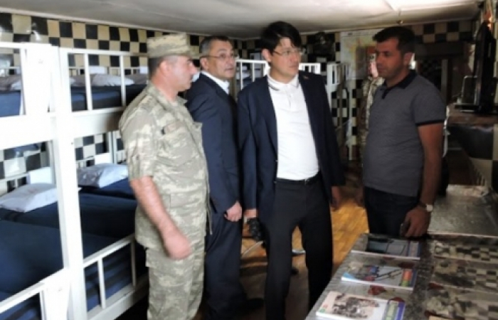 Azerbaijani MPs and journalists visit front-line troops.