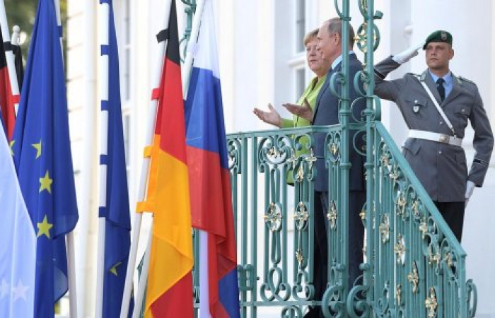 Меркель обсудила с Путиным глобальные и двусторонние вопросы