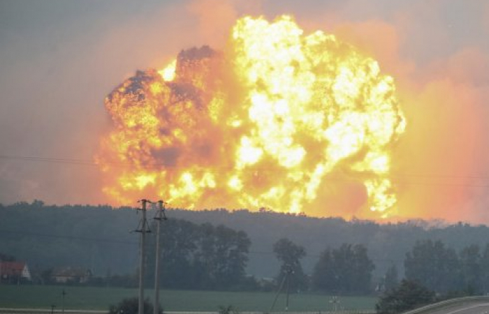 Thousands evacuated after explosions at a munitions depot in Ukraine