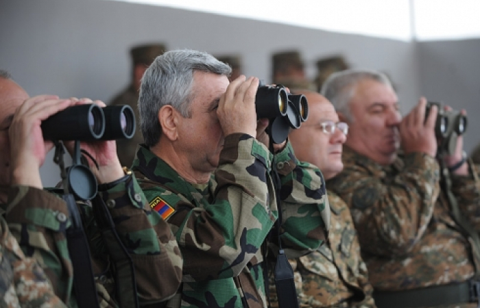 What does he see? The Armenian President in Nagorno-Karabakh to watch military manoevres.